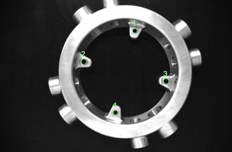 Component with through-holes and blind holes